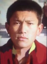 Tibetan protester carrying Dalai Lama’s portrait detained by Chinese traffic police Tibetan protester carrying Dalai Lama’s portrait detained by Chinese traffic police