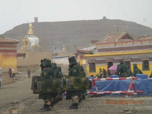 Armed police make their way into Kirti Monastery in March 2010