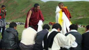 An undated image of Tenzin Lhundrup acknowledging the members of Naglha Dzambha Mountain Protection Committee for resisting mining activities at the sacred mountain.