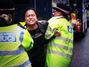 One of the two Tibetan protesters, Sonam Choden, during the protest (Photo: Tibetan Community in UK) 